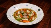 Chicken broth with meat, liver dumplings and celestine noodles